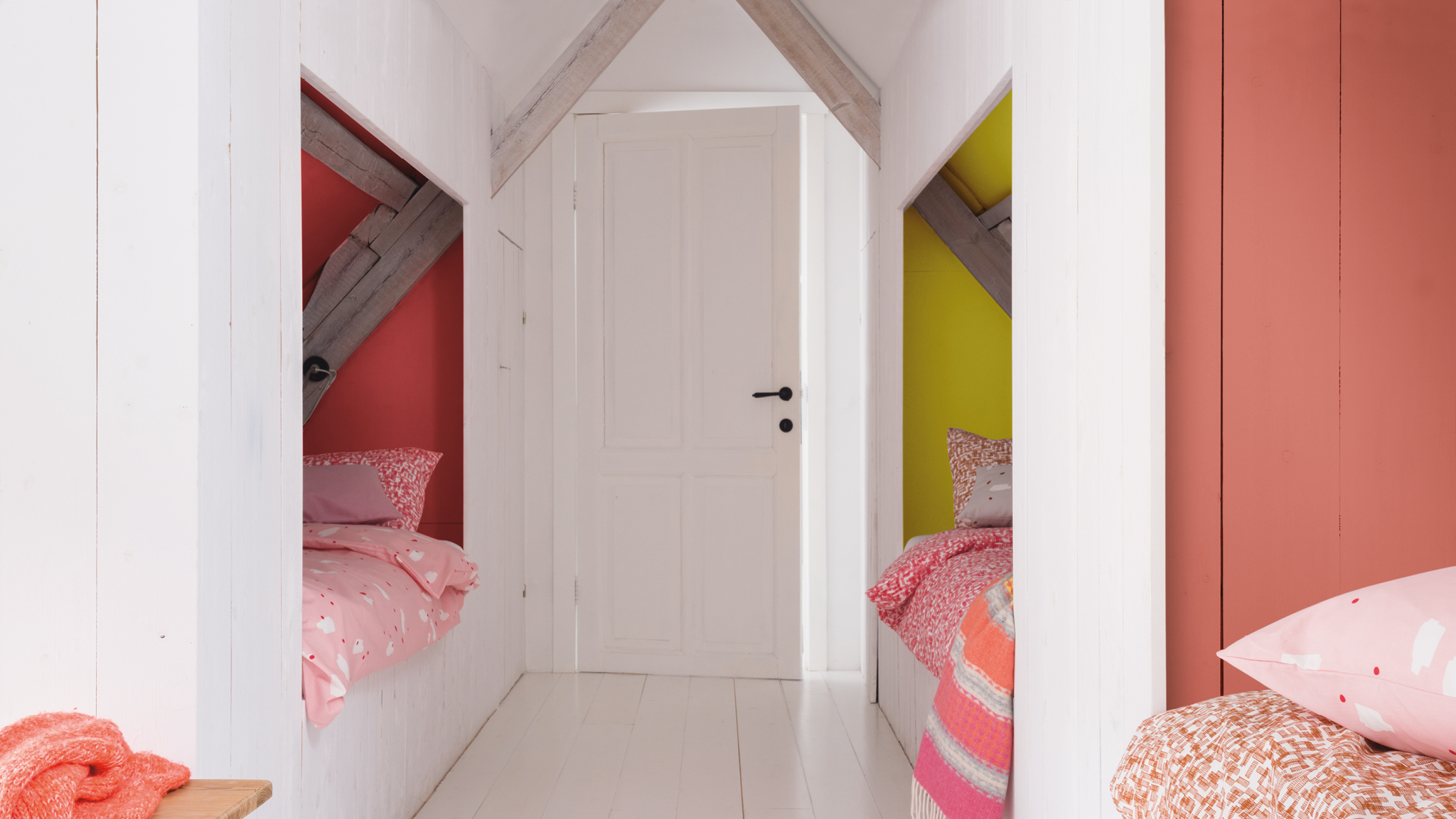 Pink alcove bedroom Paint recess areas in complementary accent colours to make the most of the space.