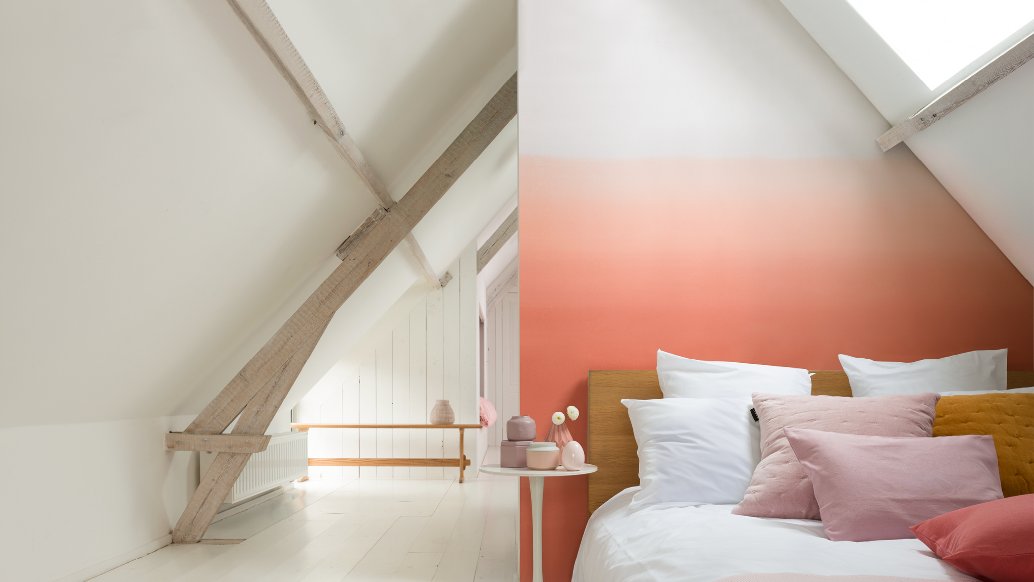 Light pink attic bedroom Create a restful breakout space with an accent colour painted fading into a neutral base.