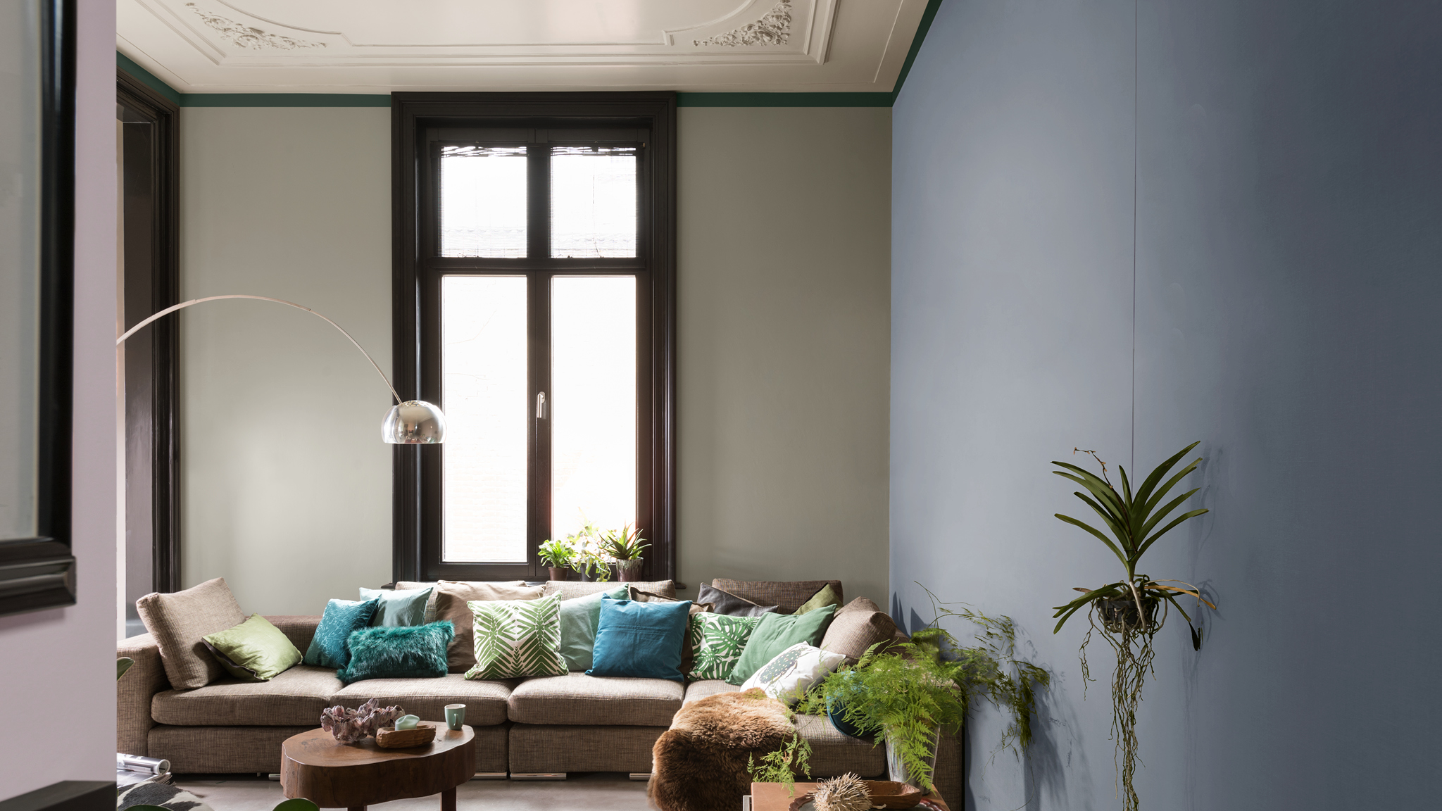 Natural green living room Find the right mix of colours to add romantic intrigue without being overpowering.