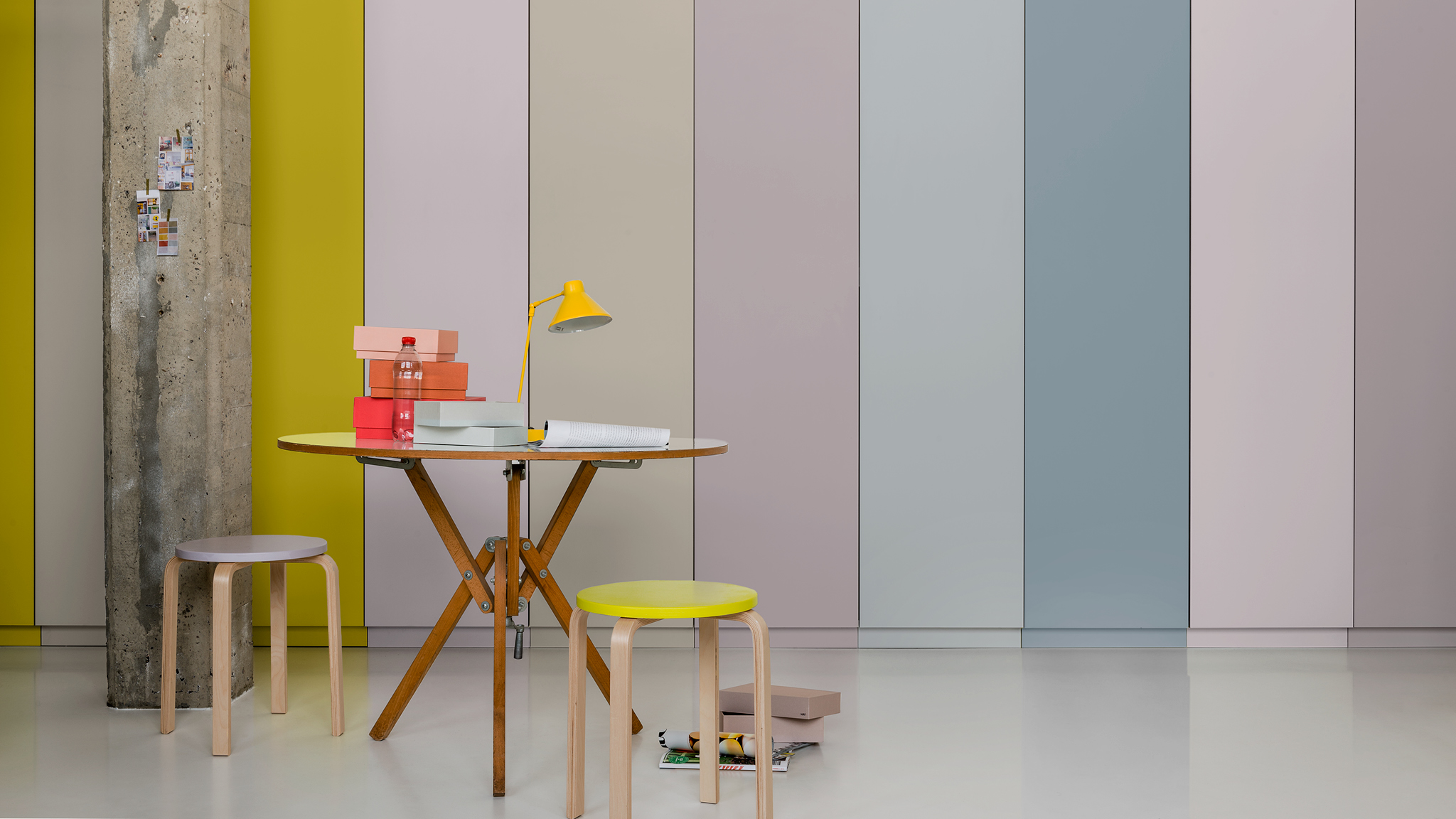Striped feature wall A striped feature wall with a bold accent yellow against subtler hues.