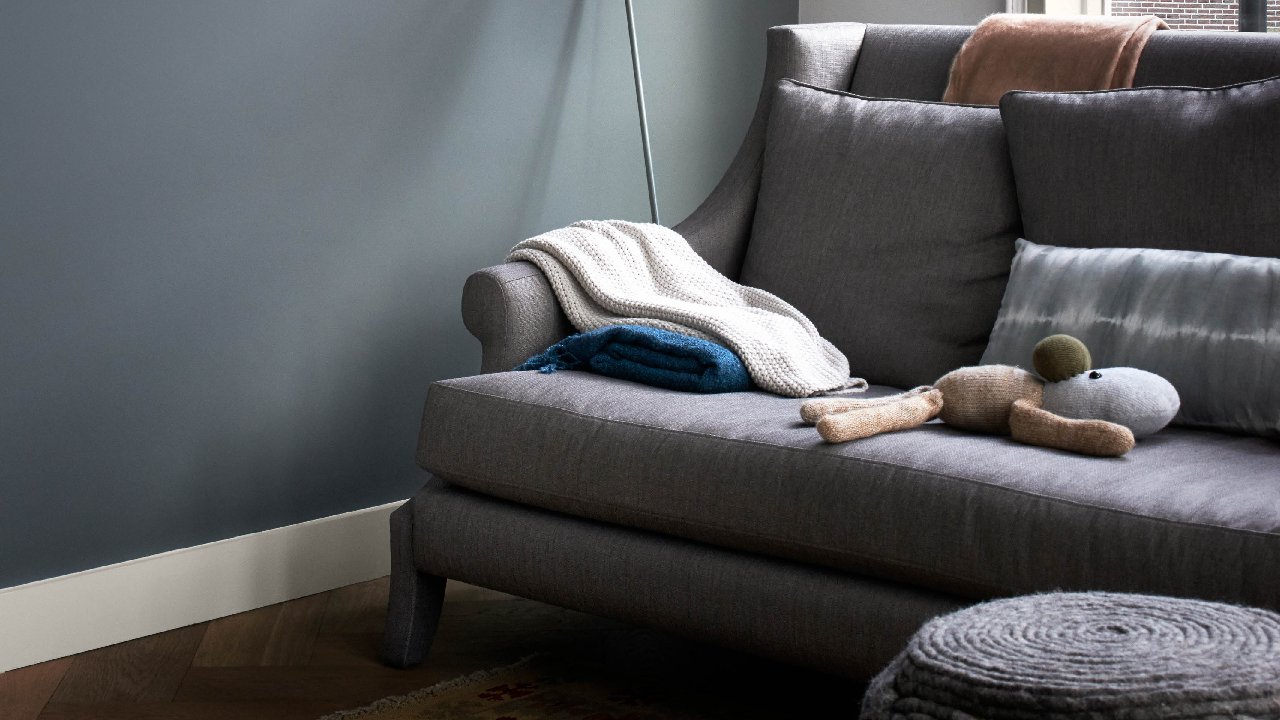 A restful grey living room Muted hues like sea green, dove grey, and duck egg have a timeless quality that will evoke a restful environment.