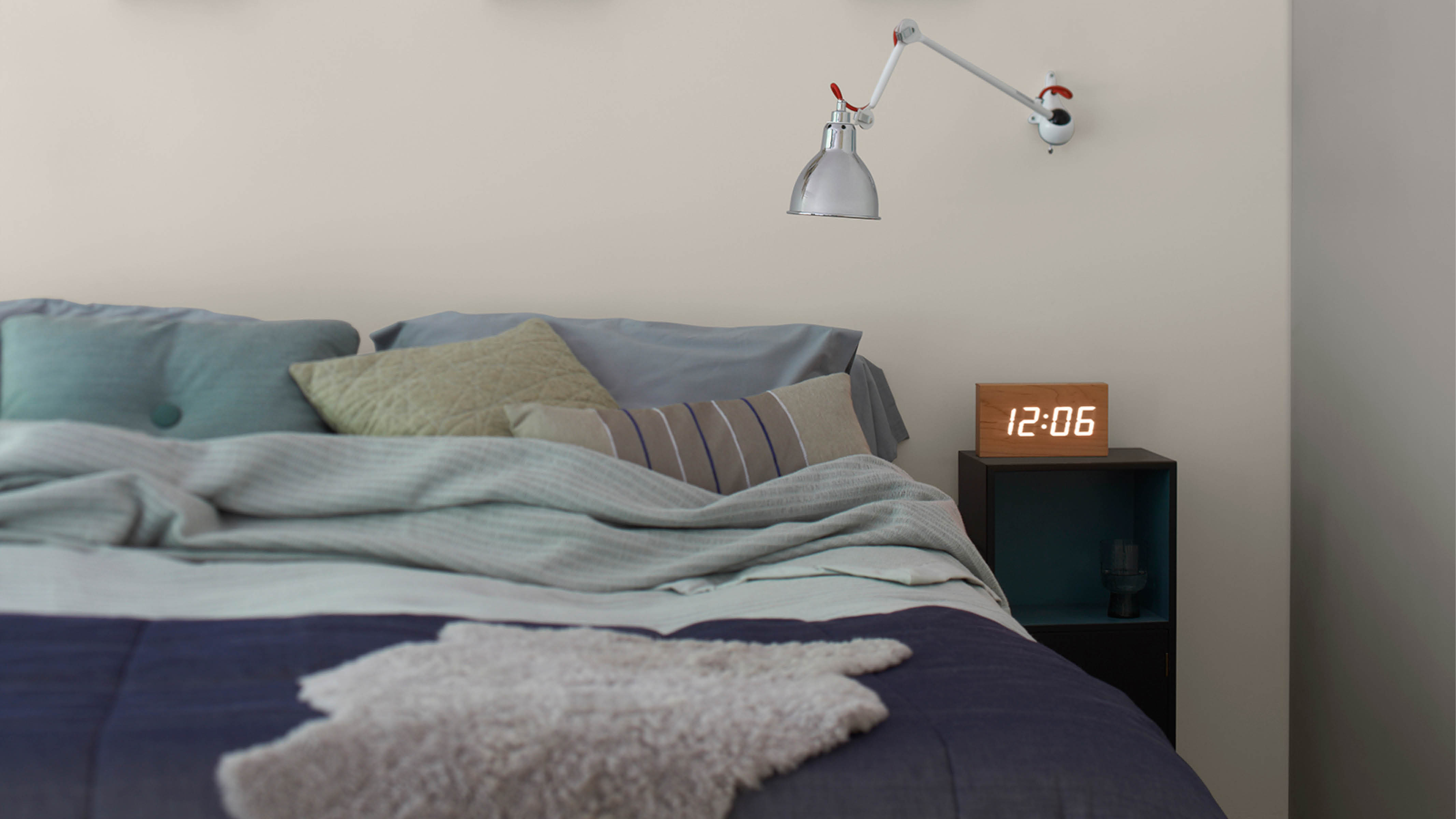 Cosy neutral bedroom Bringing together different textures and finishes – such as pure cotton sheets, a thick rug and a soft woollen throw – will help you to build up layers of comfort in the room.