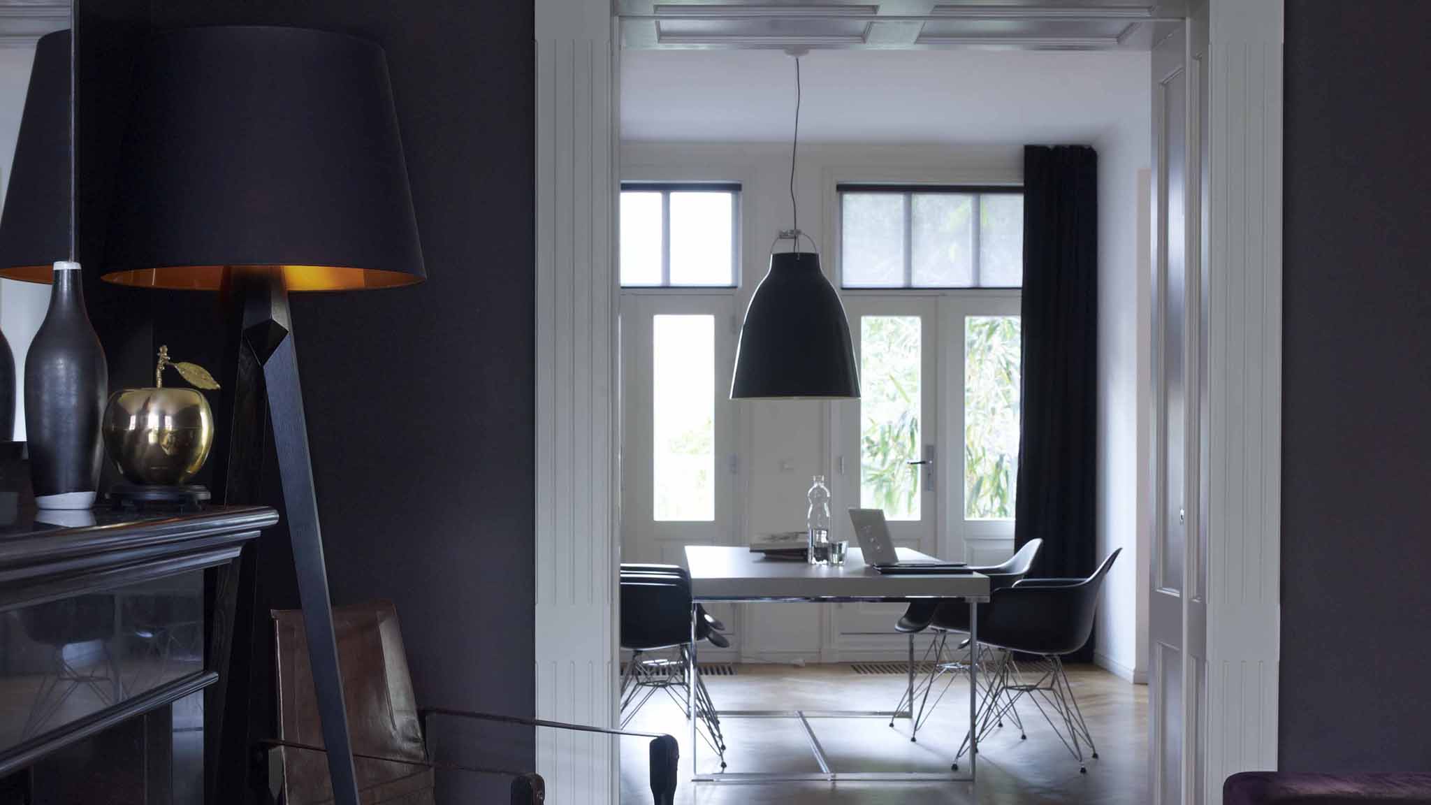 Create depth with dark tones Some darker shades – such as deep, inky blues - are actually recessive, meaning they will add depth to your space and make a room feel larger