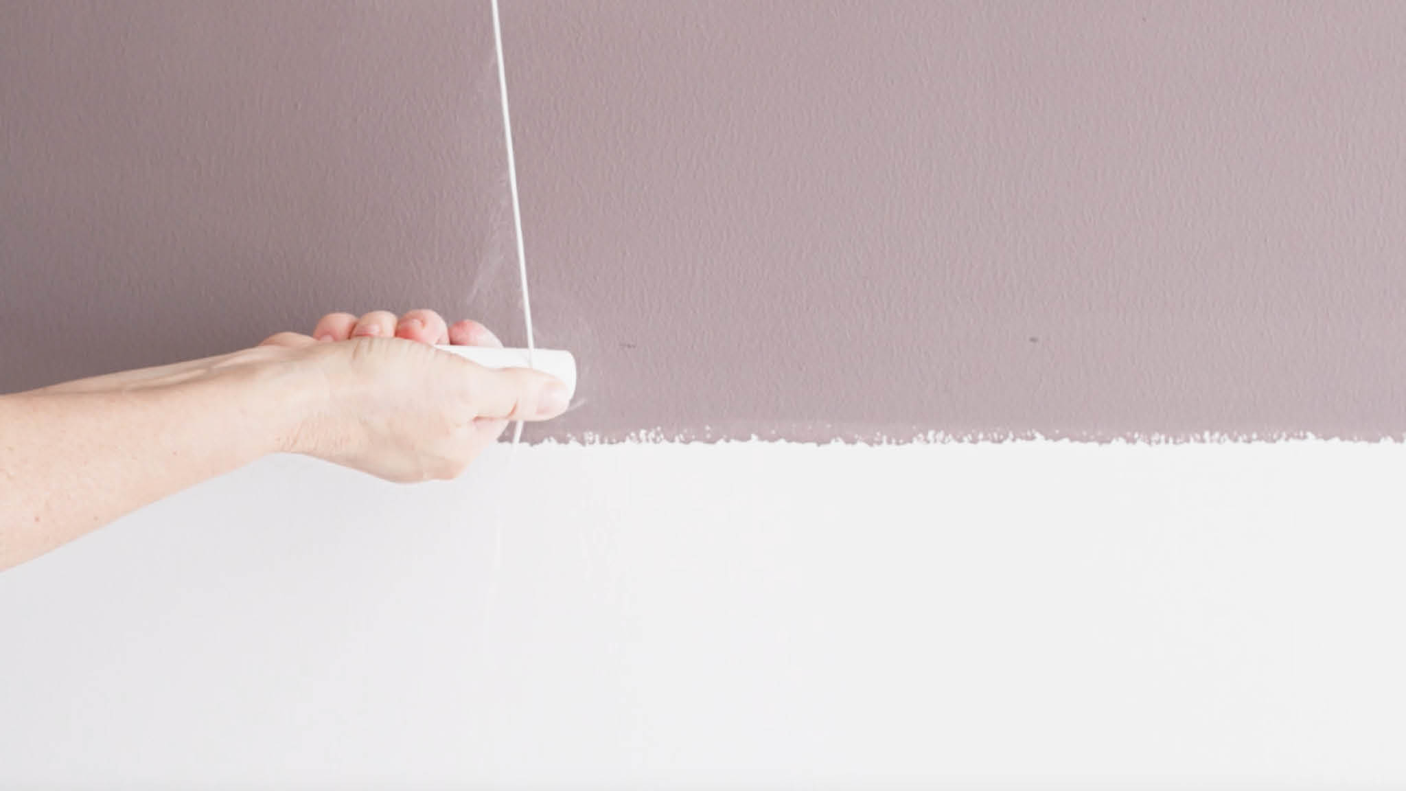 Remarking your wall split with chalk and string Remark the line where your two tones will split with chalk and string