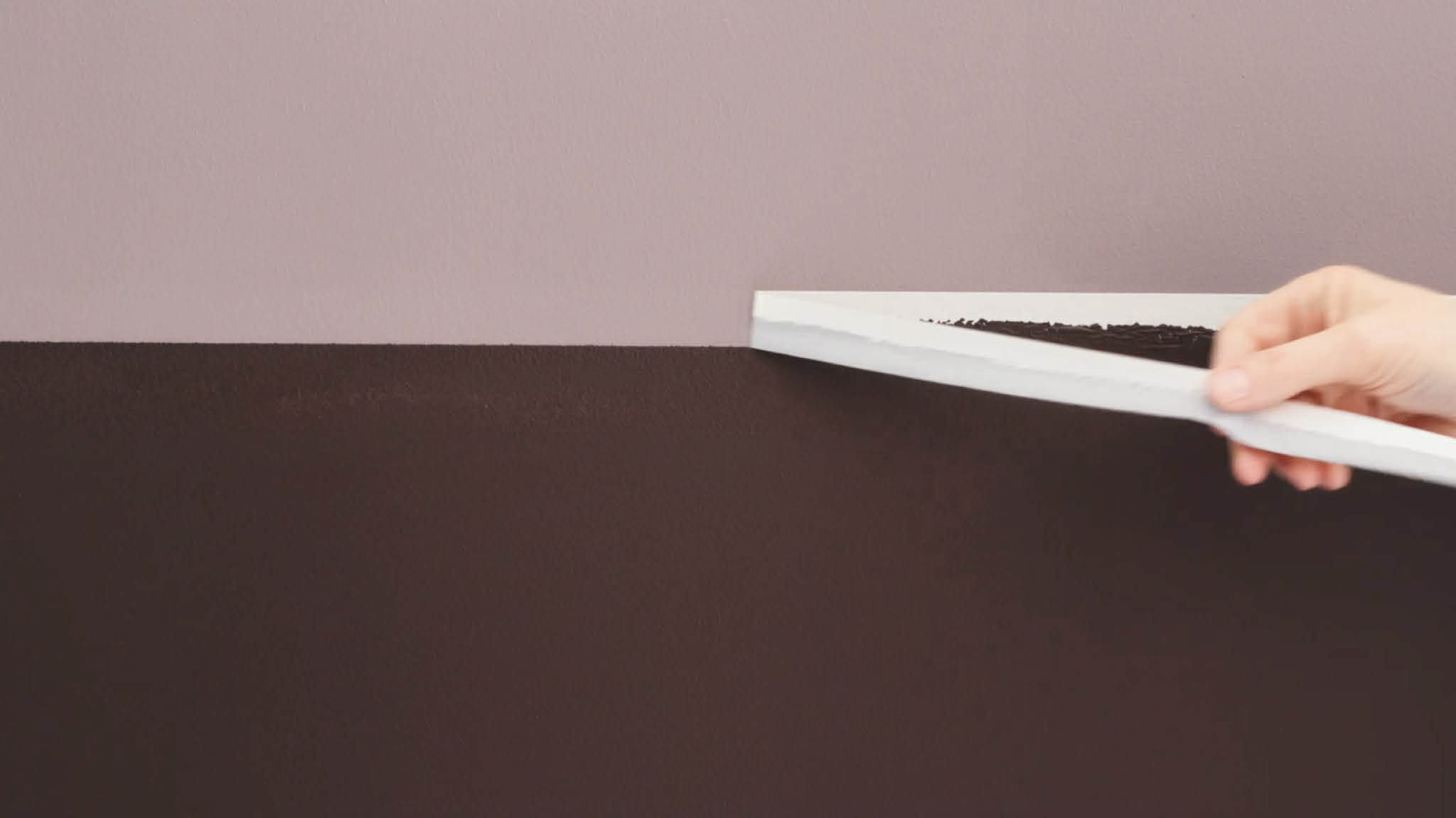 Unveil your two-tone wall Remove the masking tape to unveil your completed two-tone wall